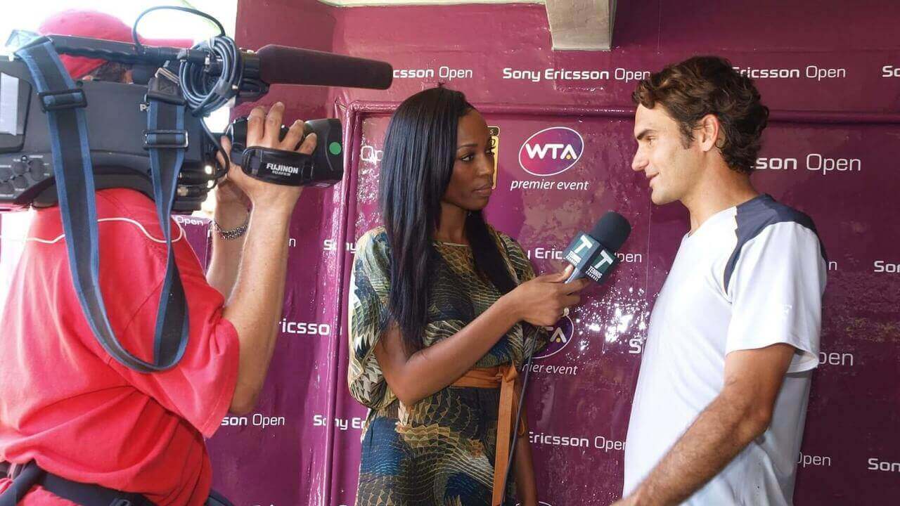 Mike Plante filming an interview with Roger Federer